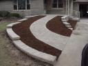 A Paver Ramp Gives Easy Access to the Front Porch for the Homeowner on the Eastside